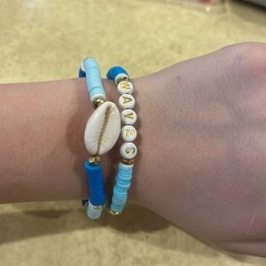 Dark and light blue waves and she’ll bracelet handmaid clay bead